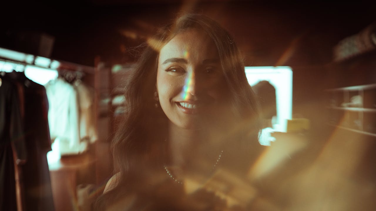 artistic-portrait-of-woman-with-light-effects-34817408