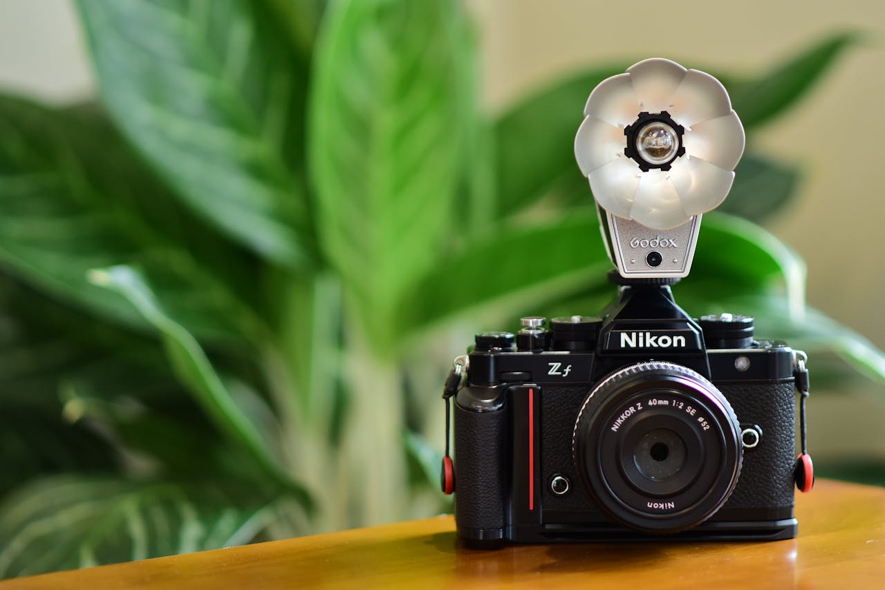 vintage-nikon-camera-with-godox-flash-setup-34860110